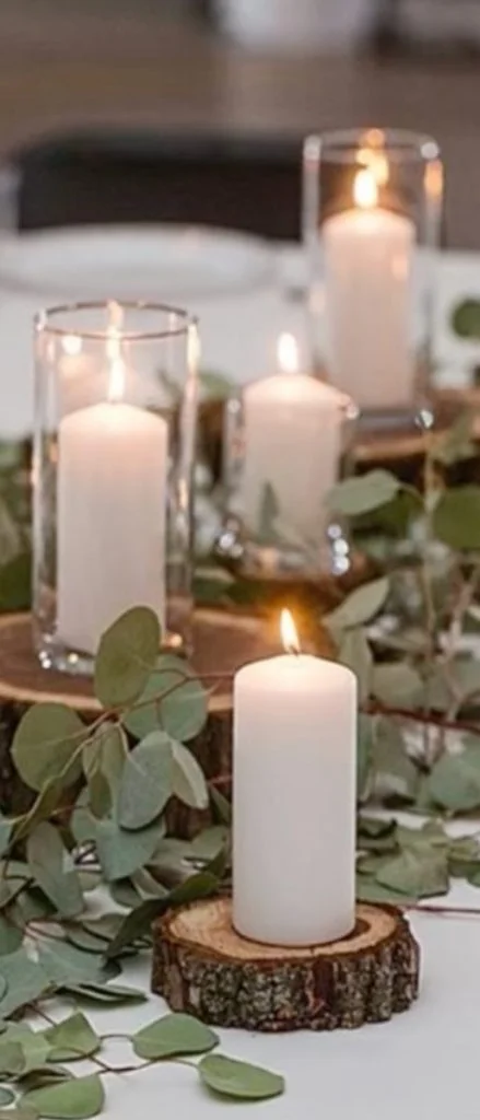 Tables setting with candles and leafs