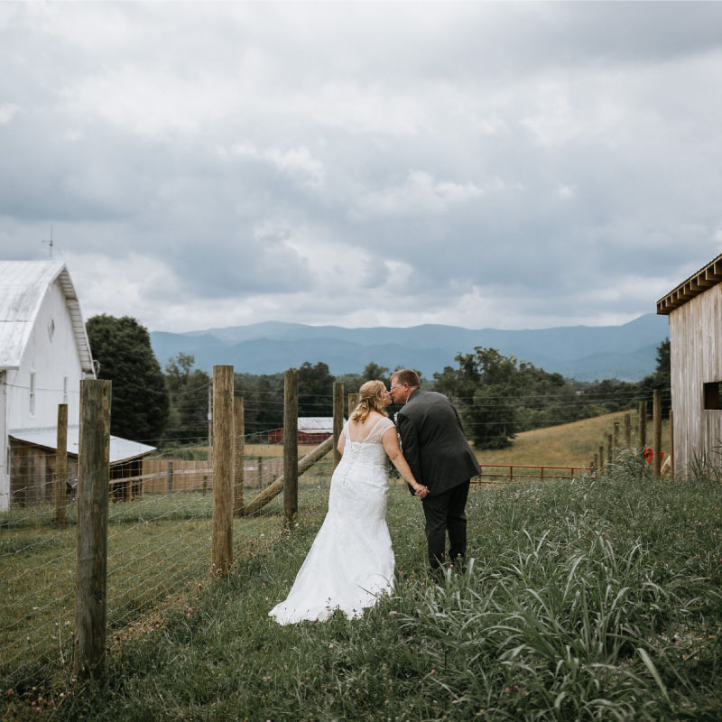 Couple kissing in the farm